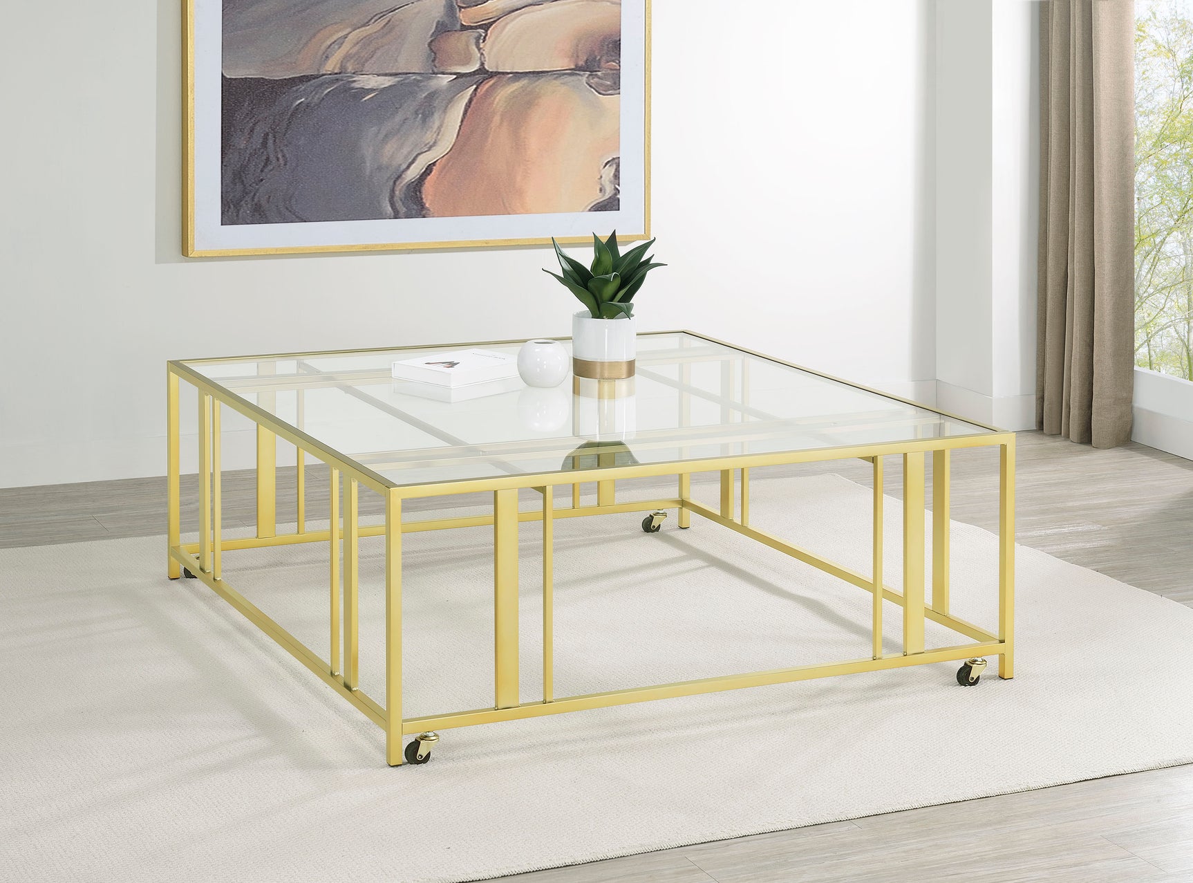 Adri Square Glass Top Coffee Table with Casters Matte Brass - Tampa Furniture Outlet