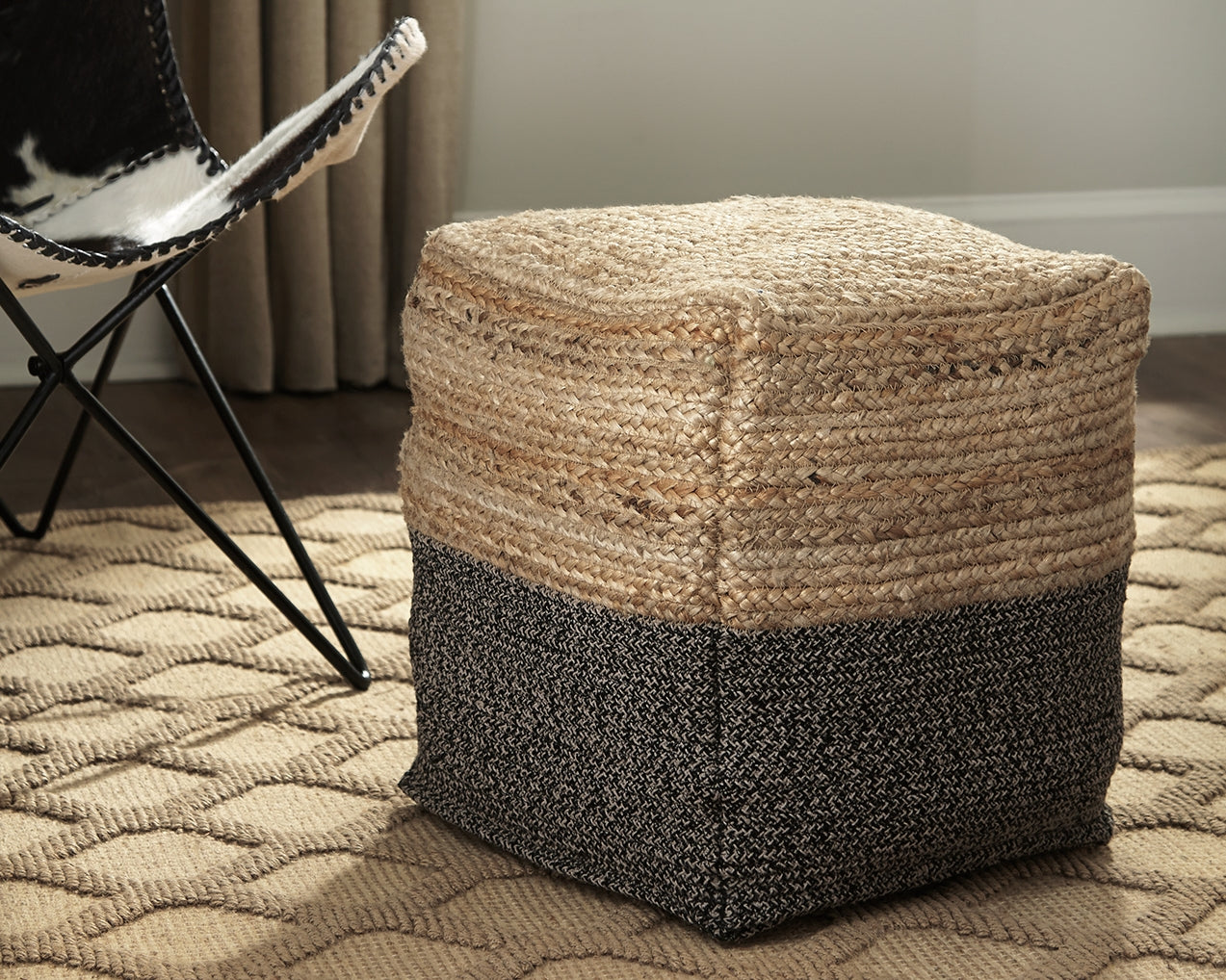 Tampa Furniture Outlet - Ashley Furniture - Sweed Valley Pouf - Pouf / Natural/Black - A1000422