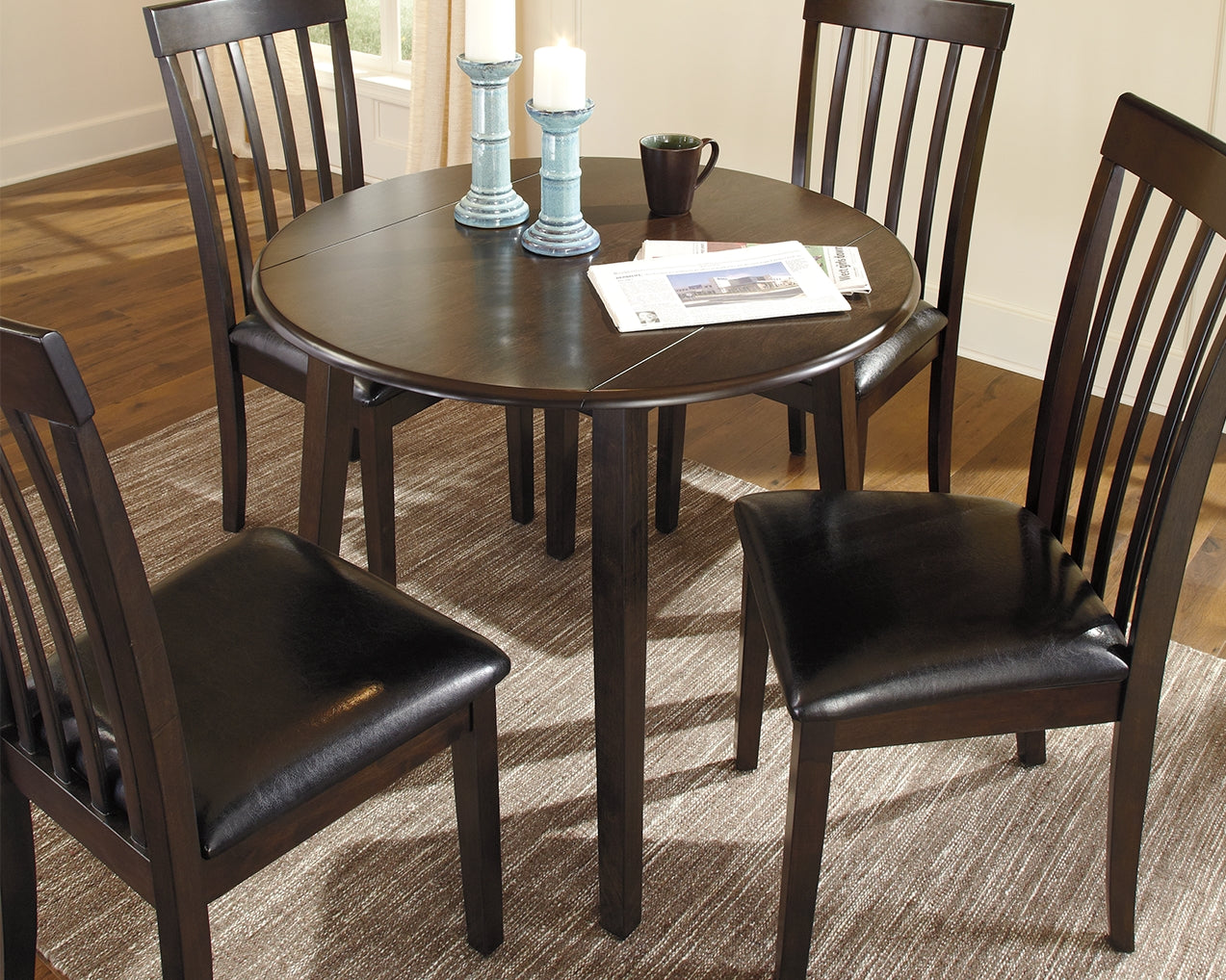 Tampa Furniture Outlet - Ashley Furniture - Hammis Dining Room - Round DRM Drop Leaf Table / Dark Brown - D310-15
