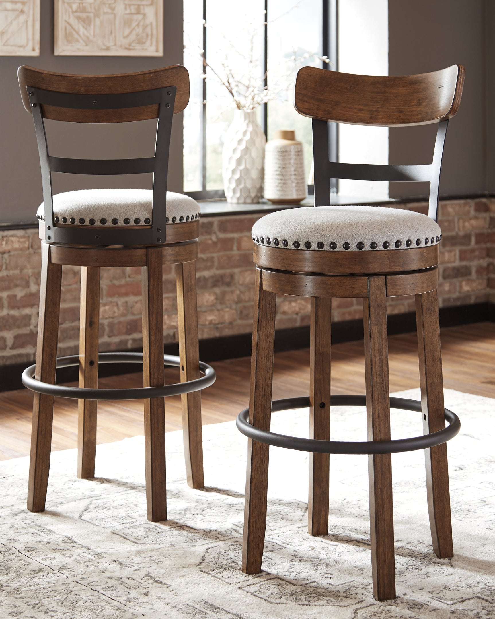 Tampa Furniture Outlet - Ashley Furniture - Valebeck Dining Room - UPH Swivel Stool (1/CN) / Black - D546-824