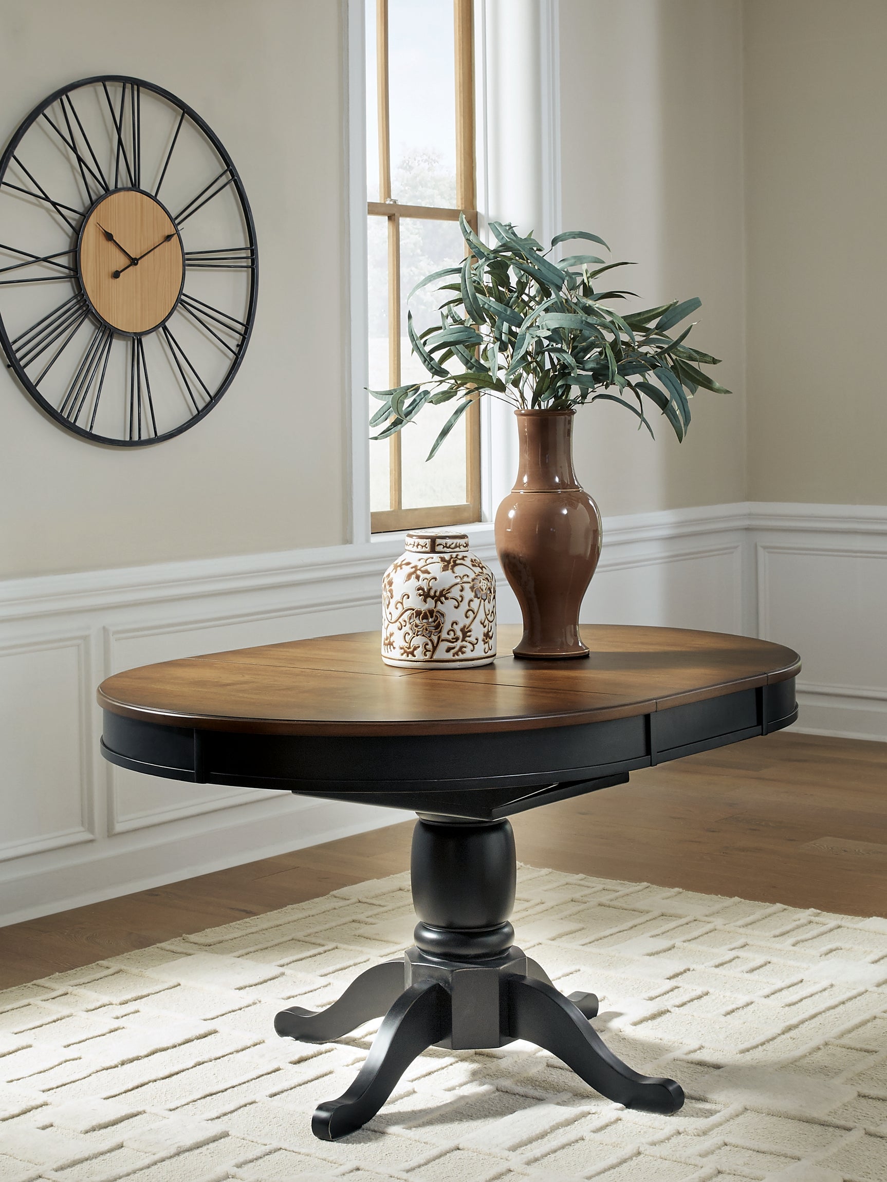 Tampa Furniture Outlet - Ashley Furniture - Clorazi Dining Room - Oval DRM Butterfly EXT Table - PCD619-48
