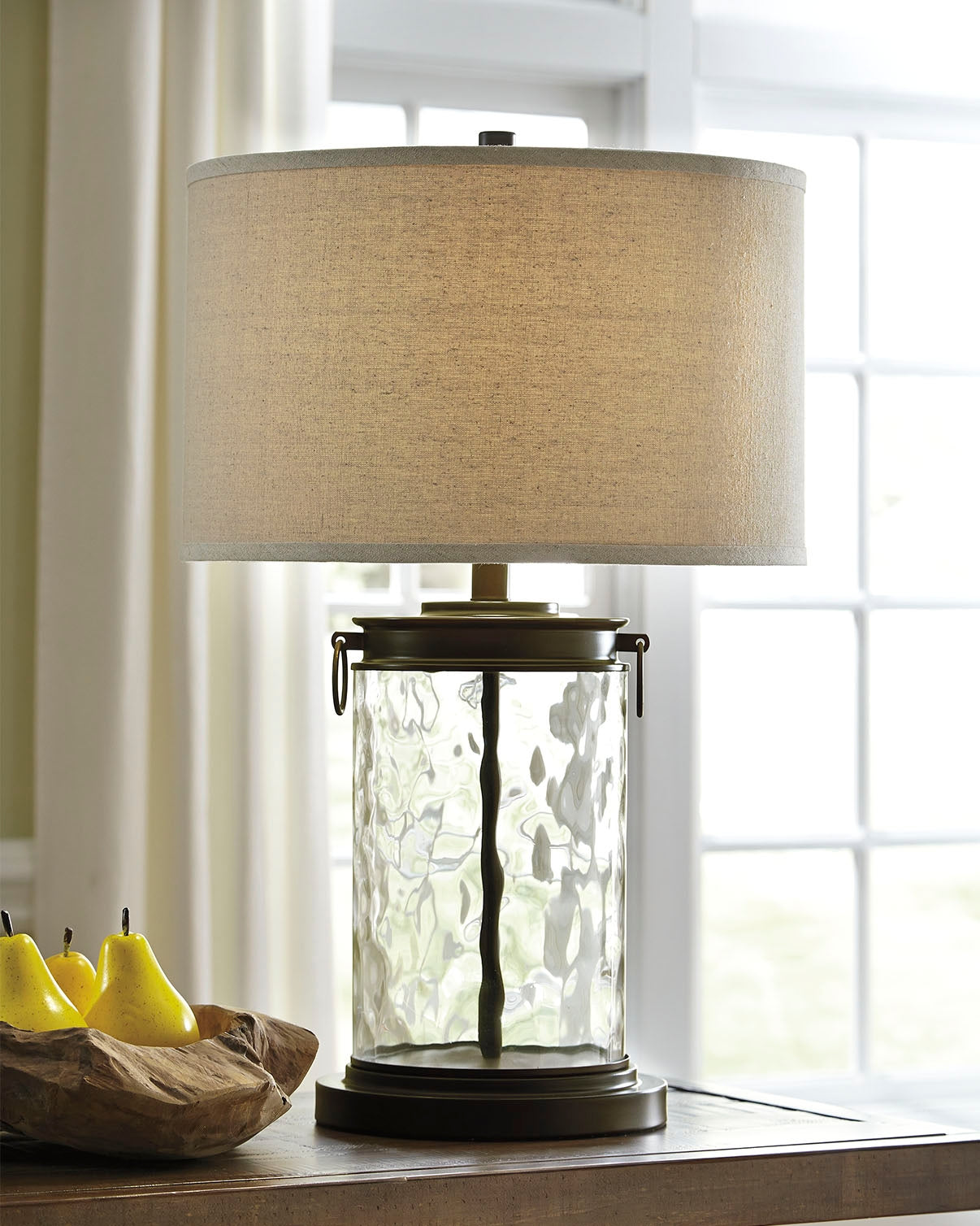 Tampa Furniture Outlet - Ashley Furniture - Tailynn Lighting - Glass Table Lamp (1/CN) / Clear/Bronze Finish - L430324