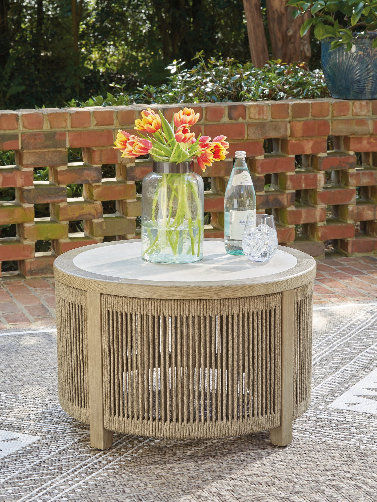 Tampa Furniture Outlet - Ashley Furniture - Spooners Cove Outdoor - Round Cocktail Table / Beige - PCP469-708