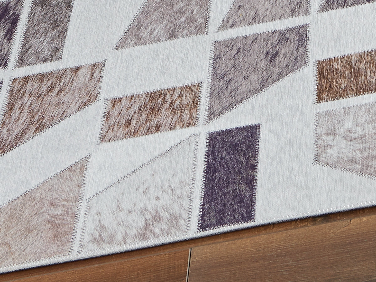 Tampa Furniture Outlet - Ashley Furniture - Jettner Rug - 7'10" x 10' Rug / Multi - R405781