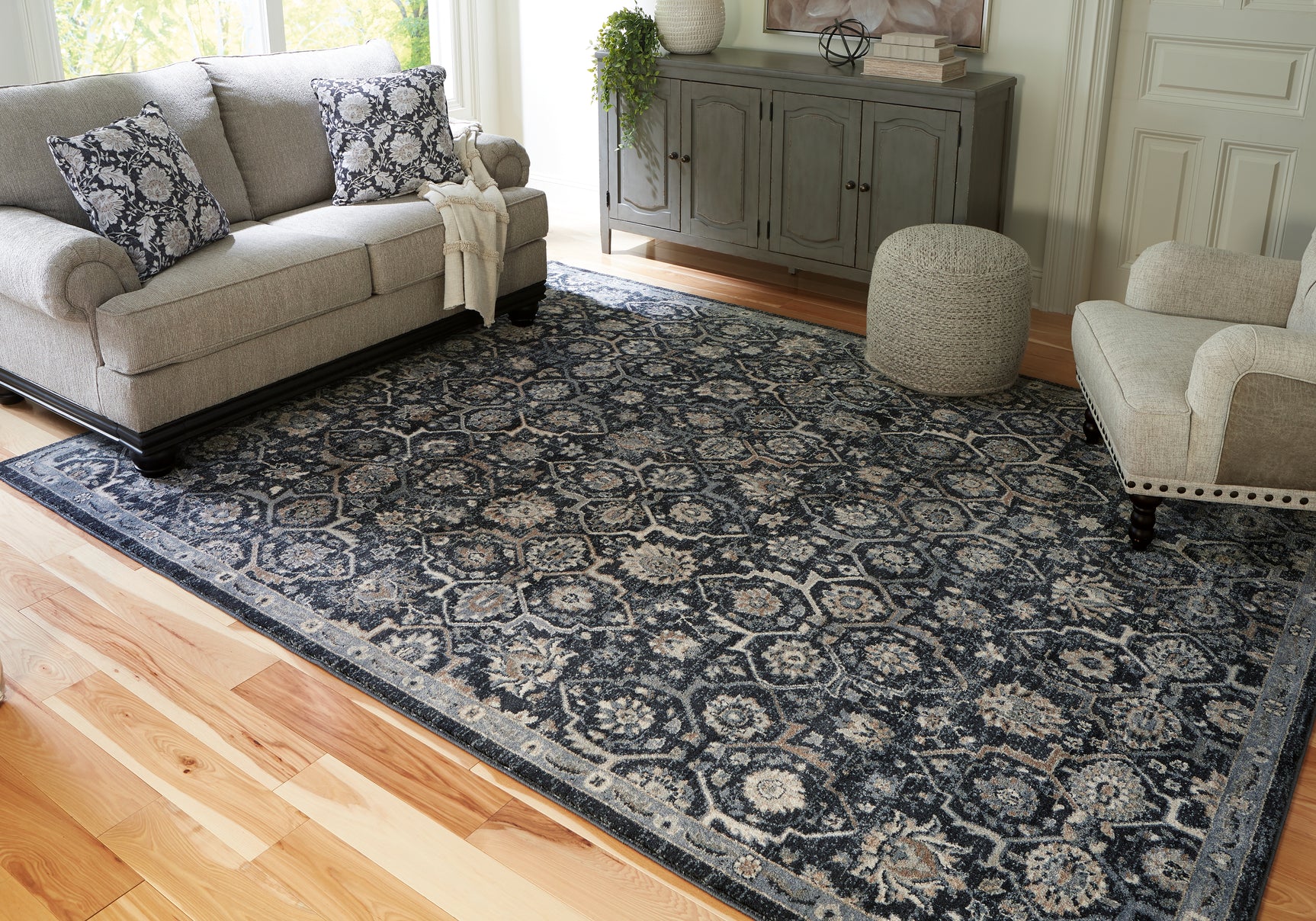 Tampa Furniture Outlet - Ashley Furniture - Hilcott Rug - 7'10" x 10'6" Rug / Blue/Cream/Brown - R406111