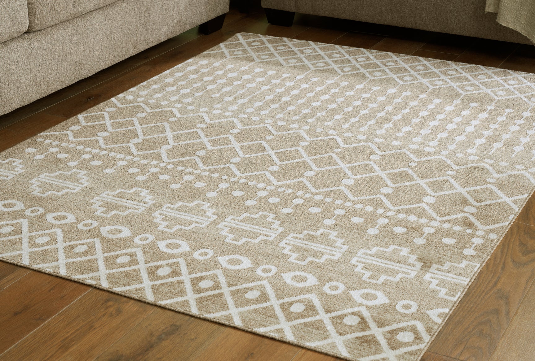 Tampa Furniture Outlet - Ashley Furniture - Bunchly Rug - 7'10" x 10'3" Washable Rug / Tan/Brown/Cream - R406221