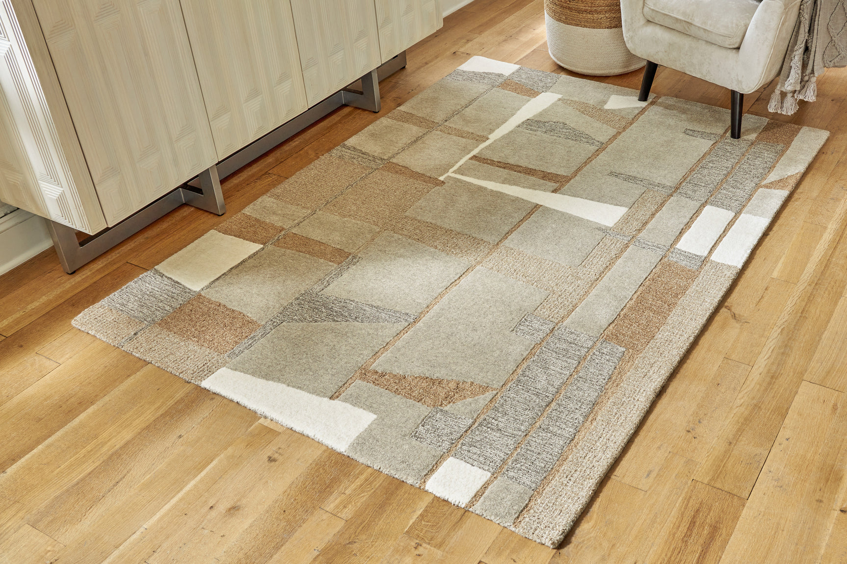 Tampa Furniture Outlet - Ashley Furniture - Abbotton Rug - 5' x 7' Rug / Taupe/Gray/Caramel - R406332