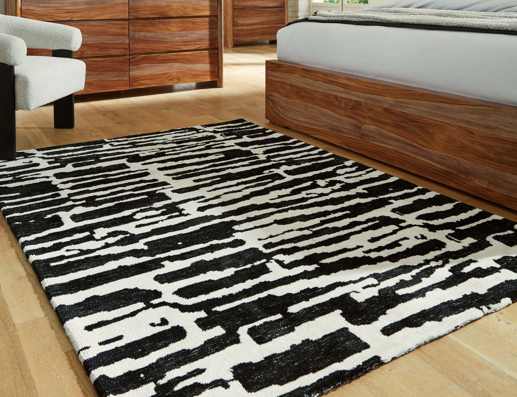 Tampa Furniture Outlet - Ashley Furniture - Bramshaw Rug - 10' x 14' Rug / Black/Ivory - R406760