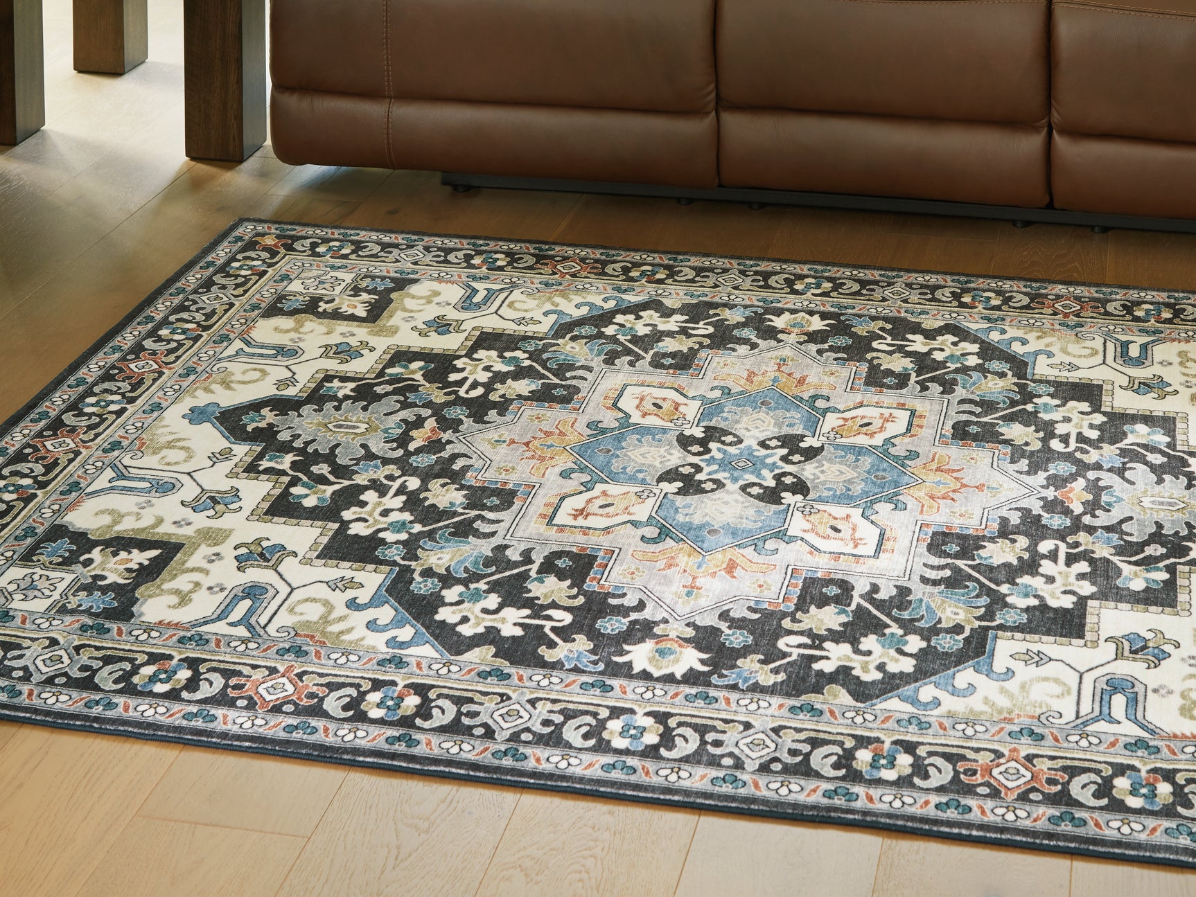 Tampa Furniture Outlet - Ashley Furniture - Leningston Rug - 5' x 7' Washable Rug / Black/Cream/Blue - R407062