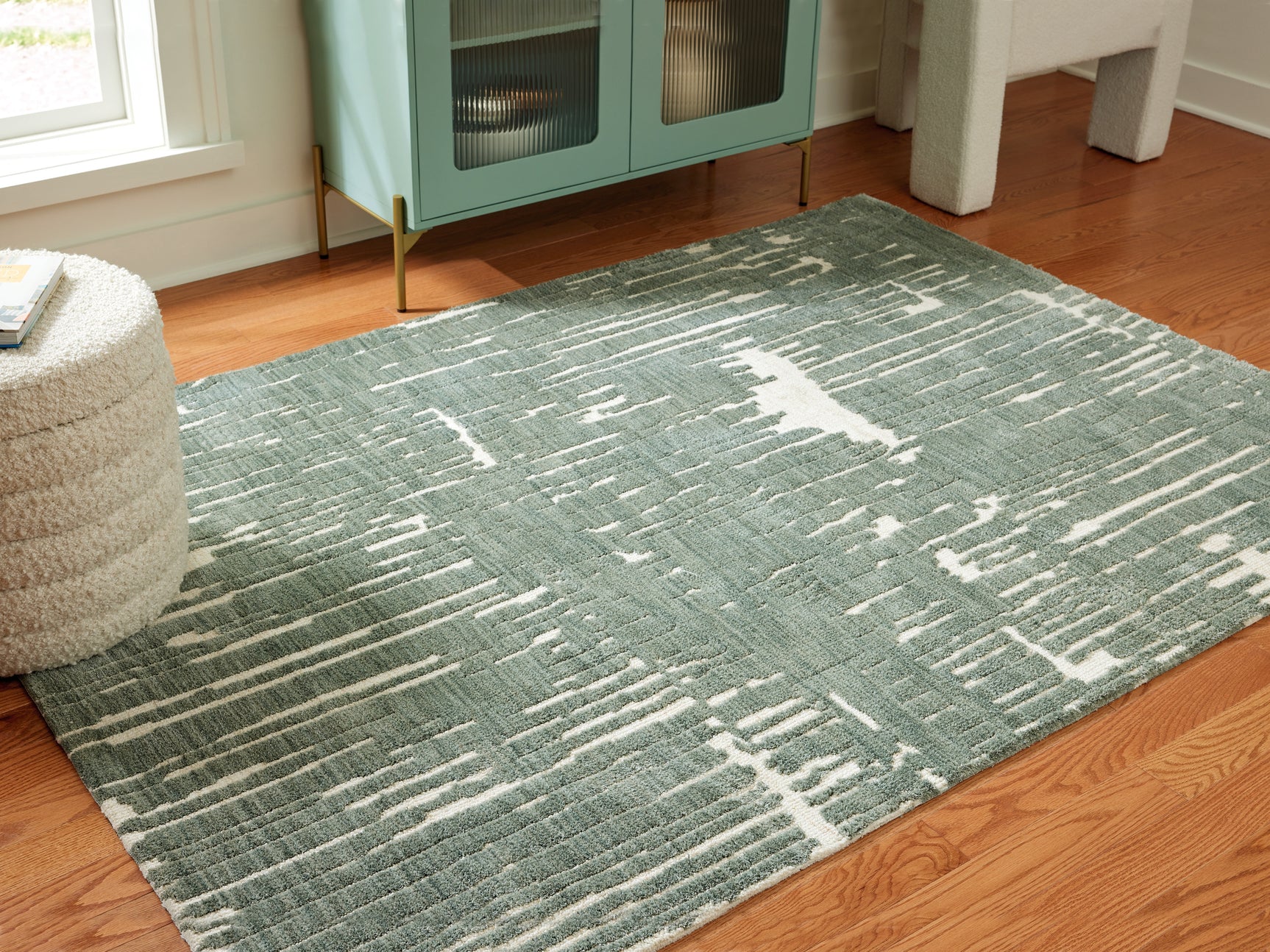 Tampa Furniture Outlet - Ashley Furniture - Cayworth Rug - 5' x 7' Rug / Teal/White - R407092