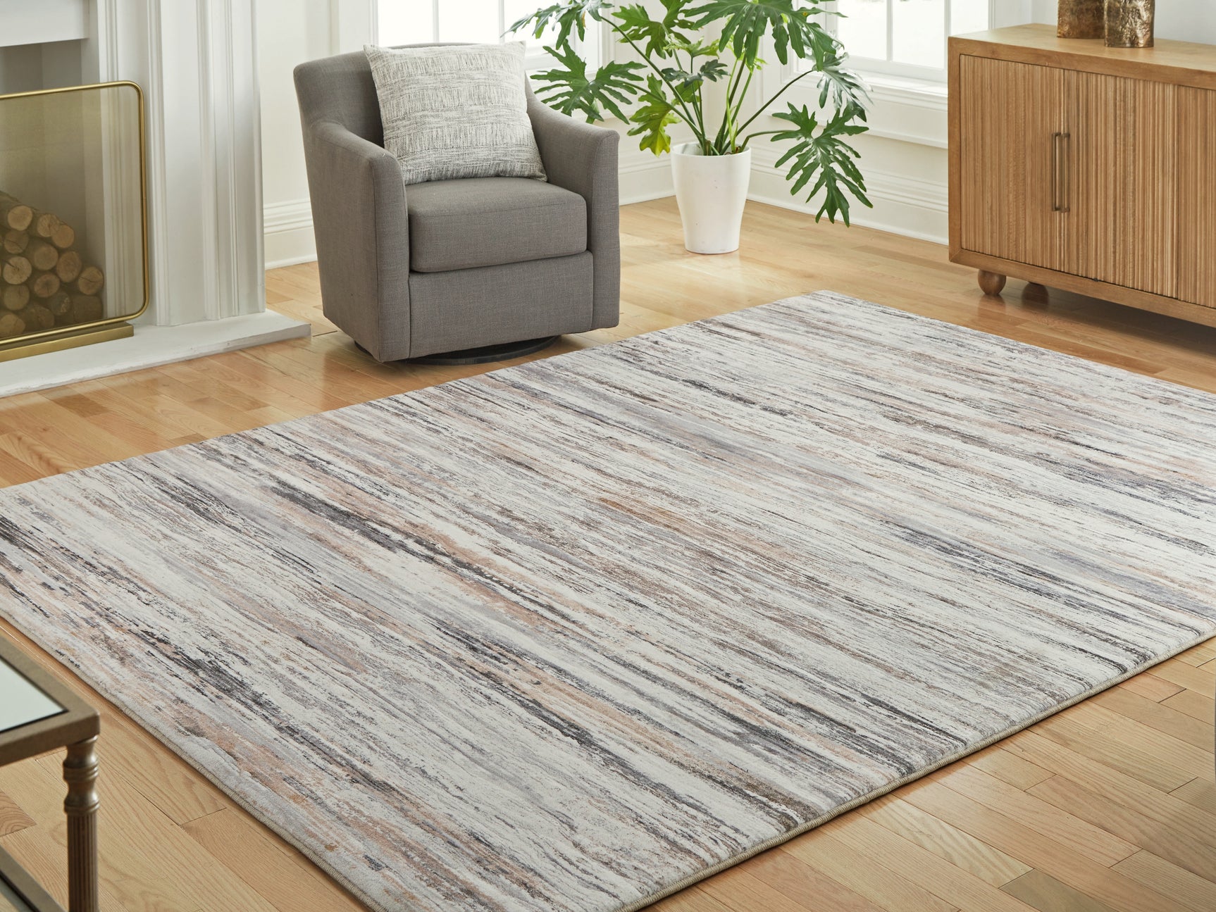 Tampa Furniture Outlet - Ashley Furniture - Nace Rug - 5' x 7' Area Rug / Gray/Brown/White - R407472