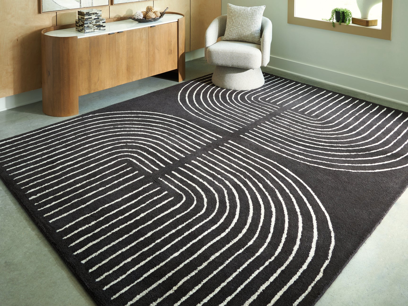 Tampa Furniture Outlet - Ashley Furniture - Eldonmore Rug - 5' x 7' Area Rug / Black/Ivory - R407572