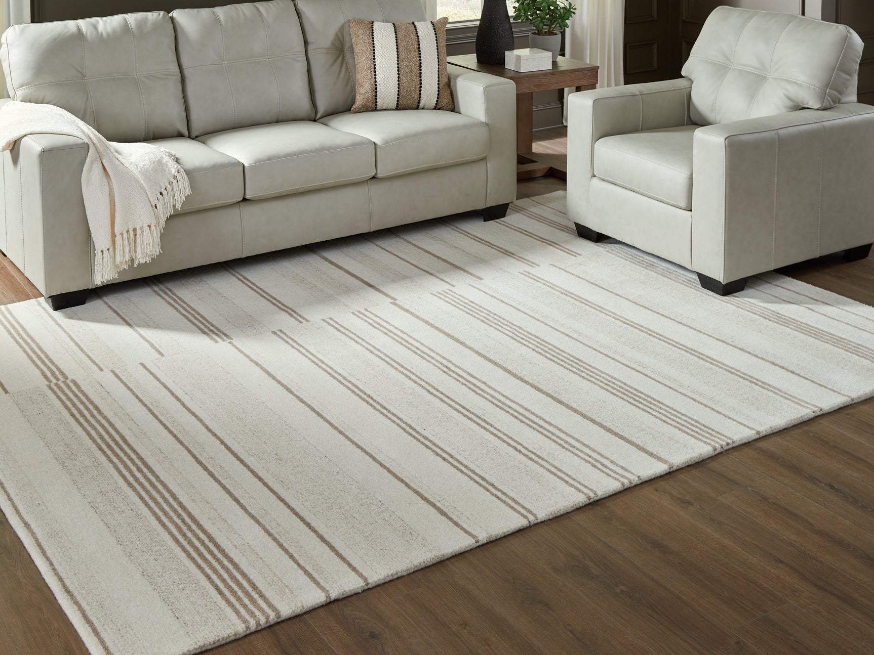 Tampa Furniture Outlet - Ashley Furniture - Gadence Rug - 5' x 7' Area Rug / Ivory/Tan - R407642