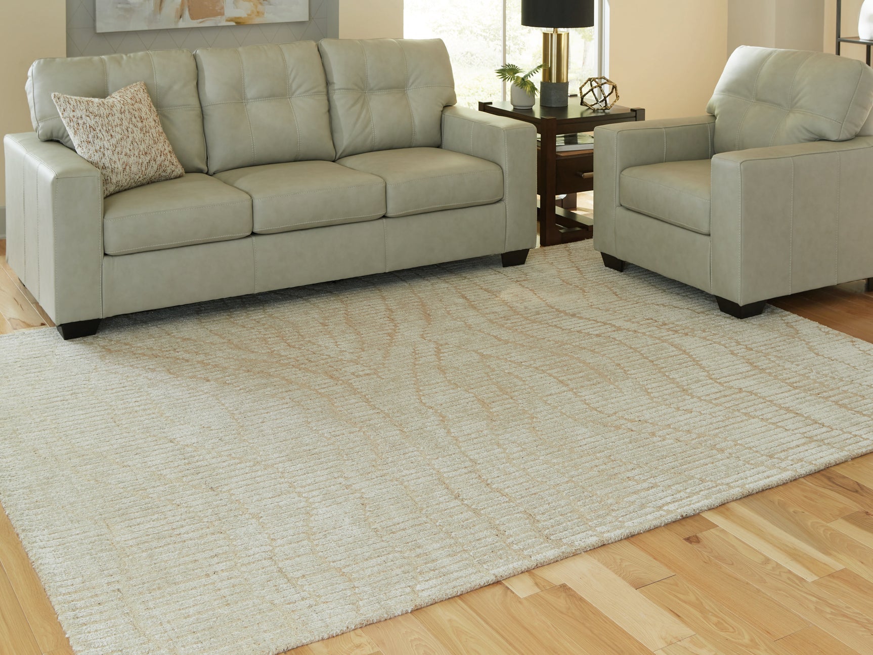 Tampa Furniture Outlet - Ashley Furniture - Jaseena Rug - 5' x 7' Area Rug / Beige/Tan - R407722