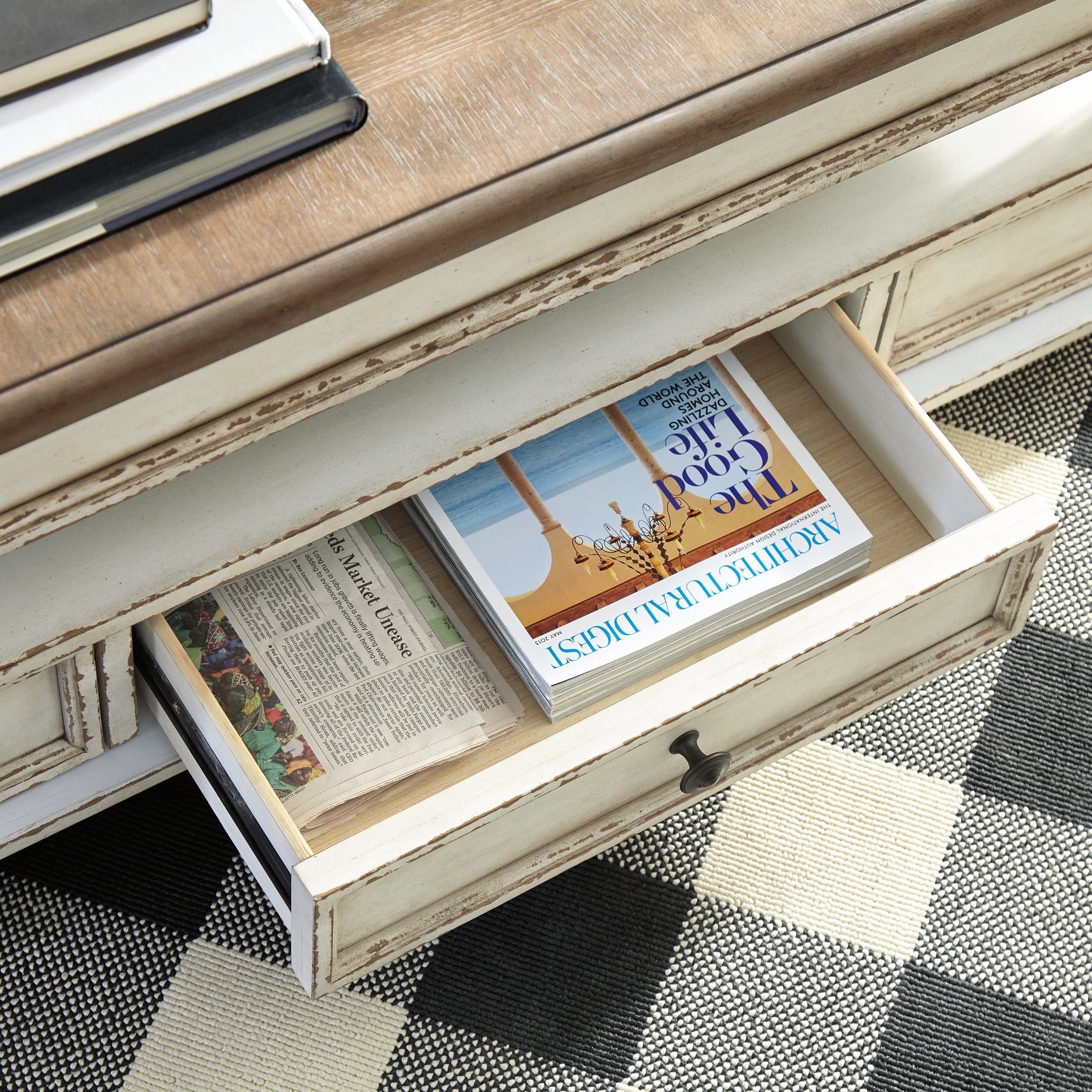 Realyn Coffee Table with Lift Top - Tampa Furniture Outlet