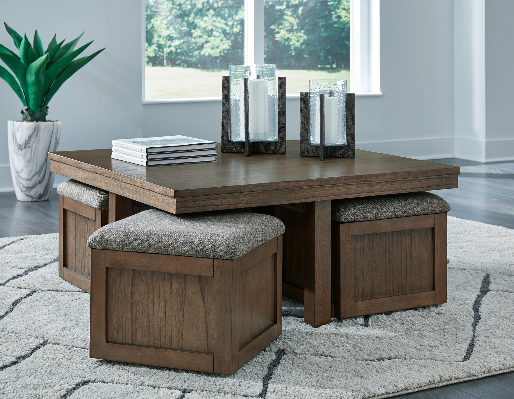 Boardernest Coffee Table with 4 Stools - Tampa Furniture Outlet