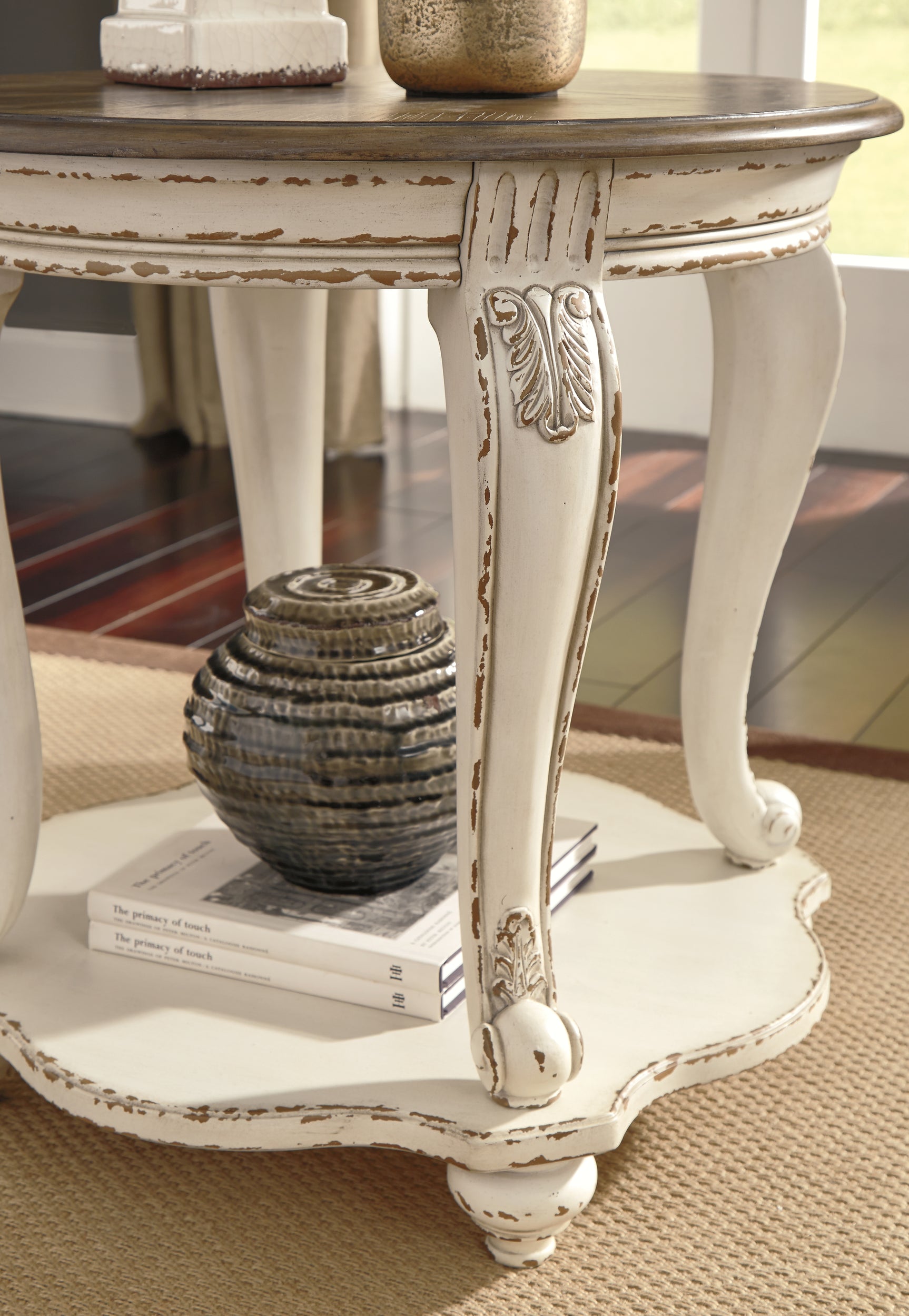 Realyn End Table - Tampa Furniture Outlet