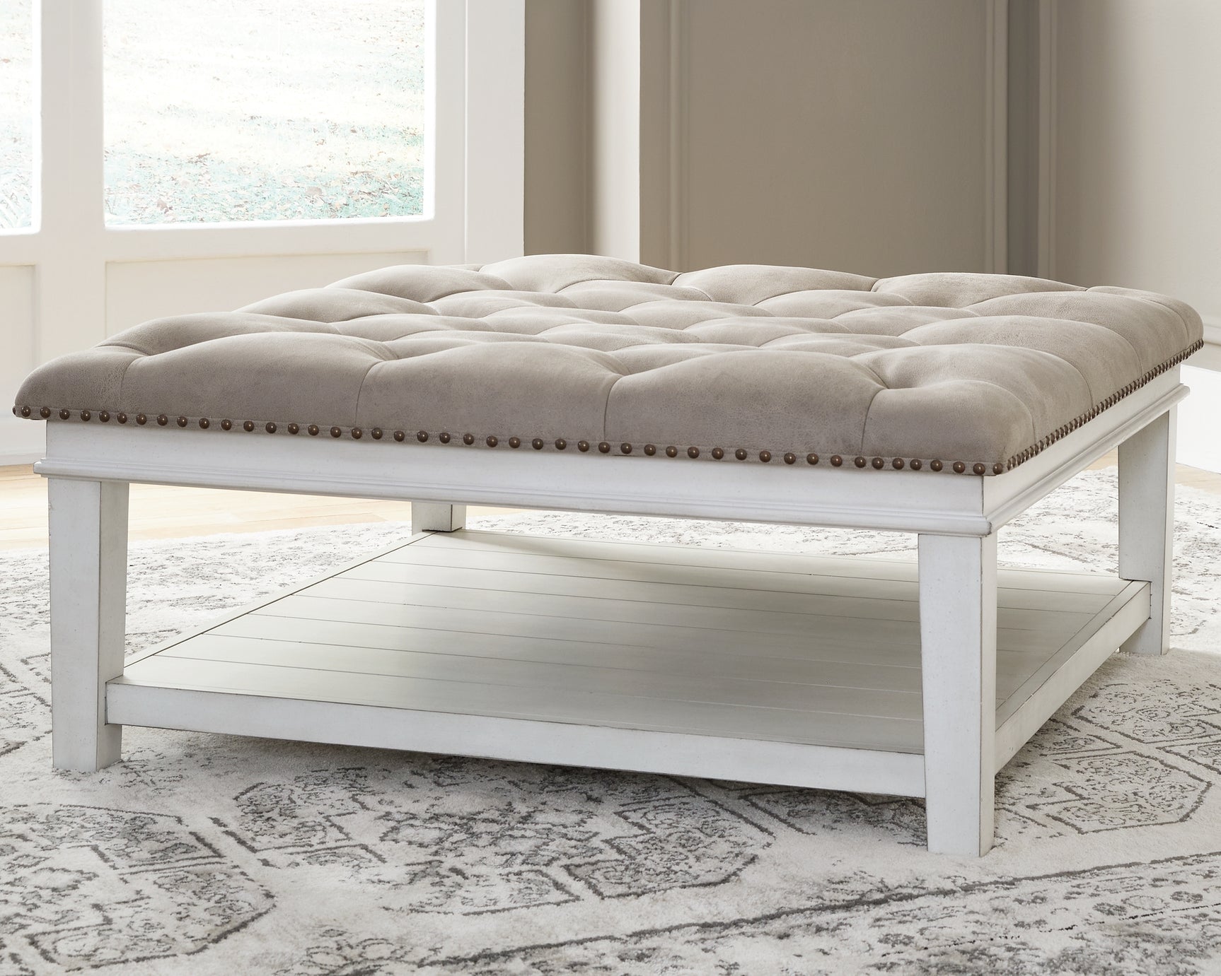 Kanwyn Upholstered Ottoman Coffee Table - Tampa Furniture Outlet