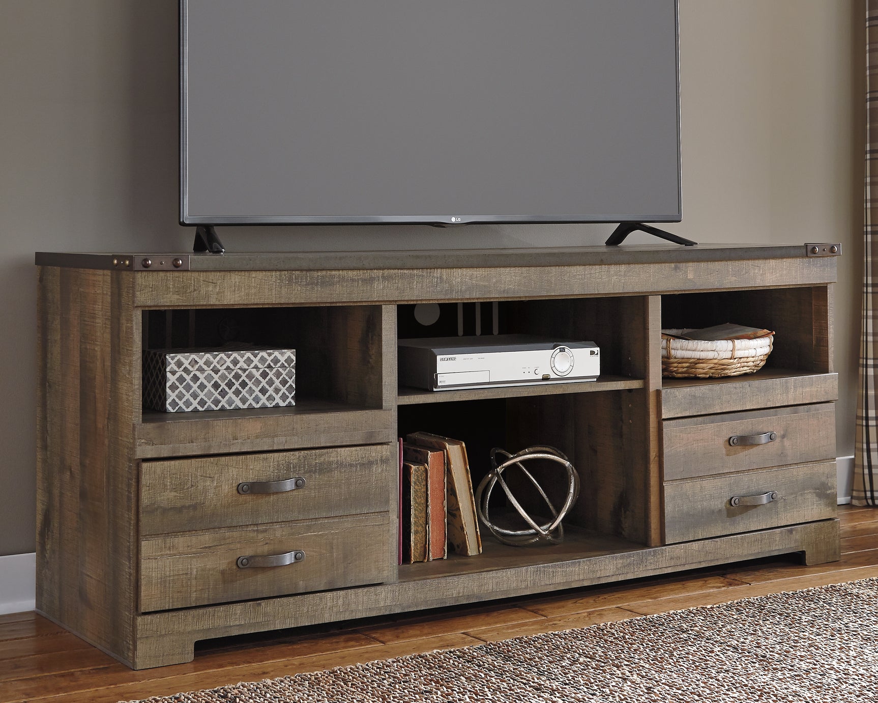 Tampa Furniture Outlet - Ashley Furniture - Trinell TV Stand - 63" / Brown - W446-68