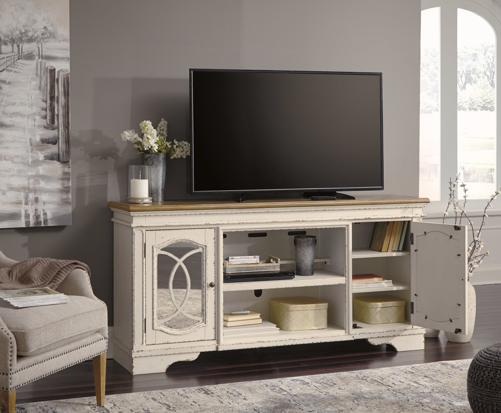 Realyn 74" TV Stand - Tampa Furniture Outlet