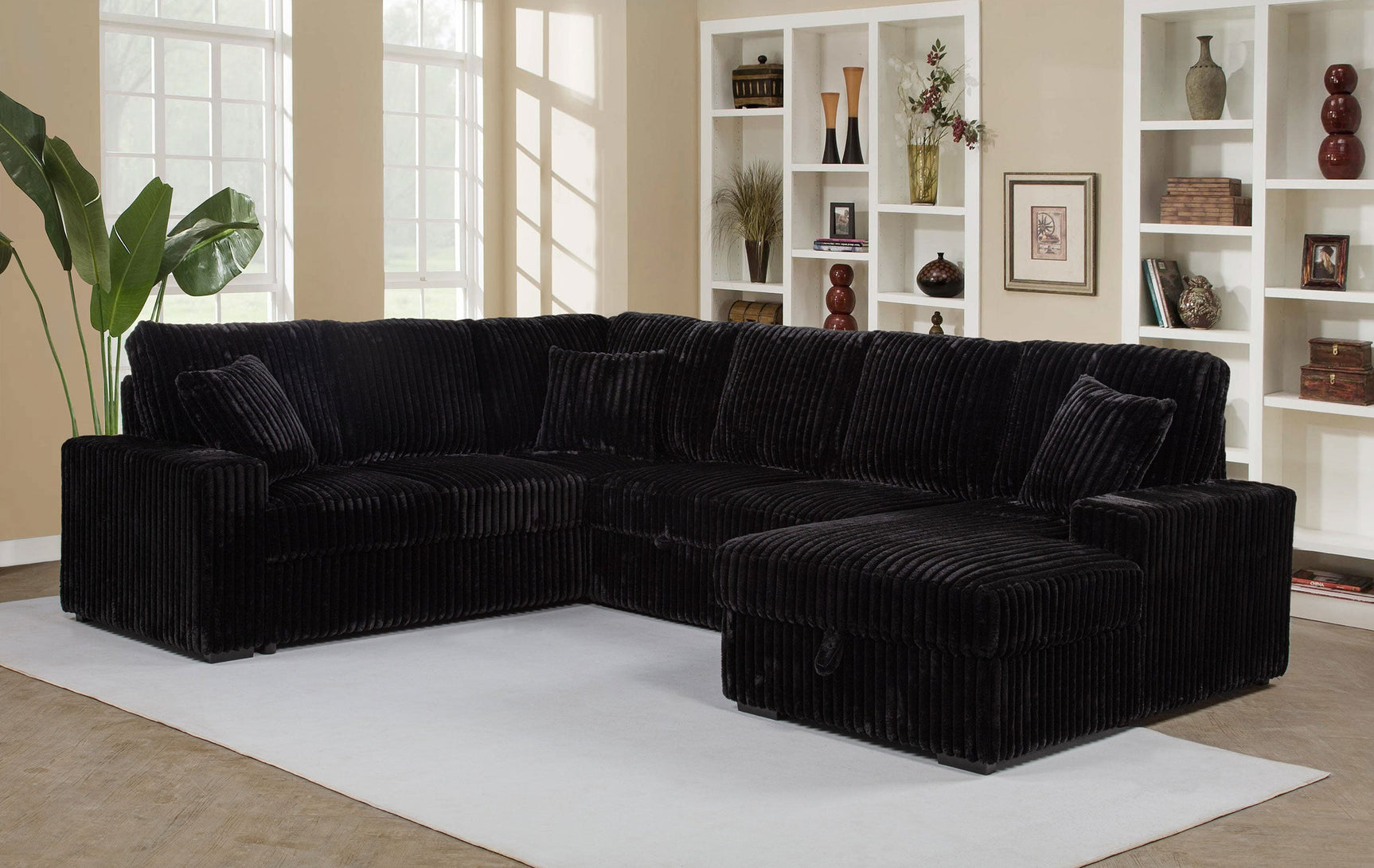 Devonshire Sleeper Sectional Sofa Storage Chaise Black - Tampa Furniture Outlet