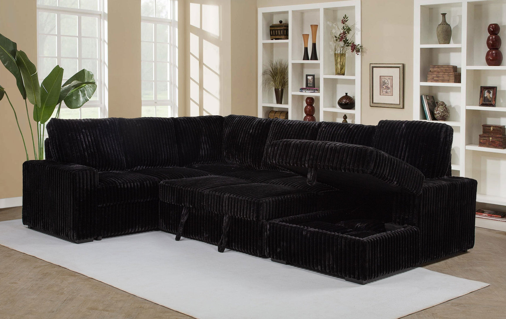 Devonshire Sleeper Sectional Sofa Storage Chaise Black - Tampa Furniture Outlet