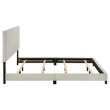 Dorian Fabric Upholstered Eastern King Panel Bed Cream - Tampa Furniture Outlet