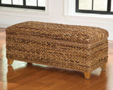 Laughton Hand-Woven Banana Leaf Storage Bench Amber - Tampa Furniture Outlet