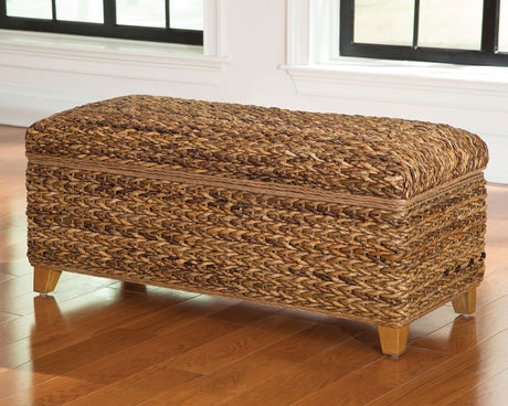 Laughton Hand-Woven Banana Leaf Storage Bench Amber - Tampa Furniture Outlet
