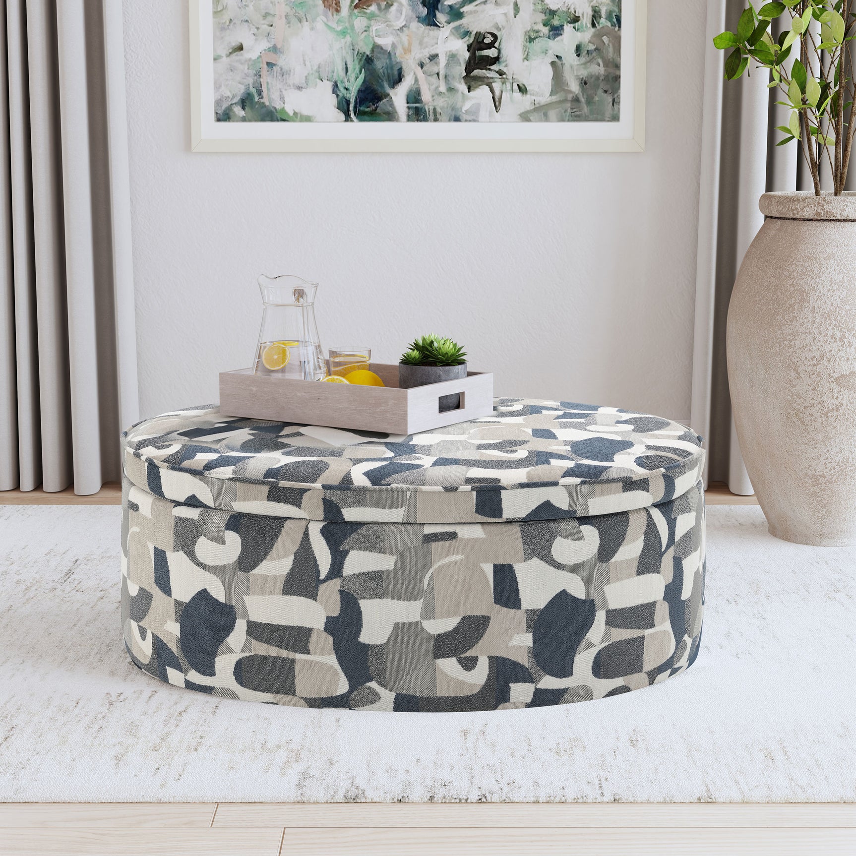 Tomkins Oval Upholstered Storage Ottoman Indigo Blue - Tampa Furniture Outlet