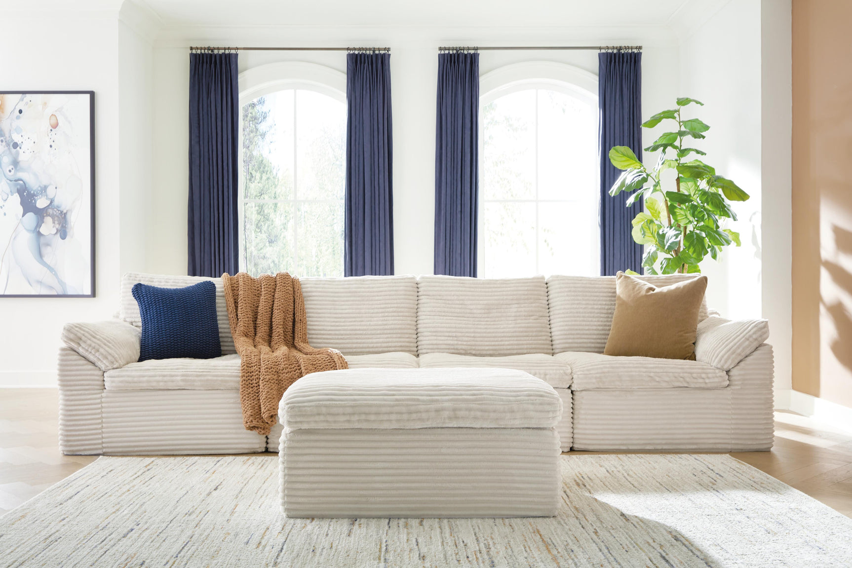 Tampa Furniture Outlet - Ashley Furniture - Fannin Sectional - RAF 4-Piece Sectional with Ottoman - PC84304S1