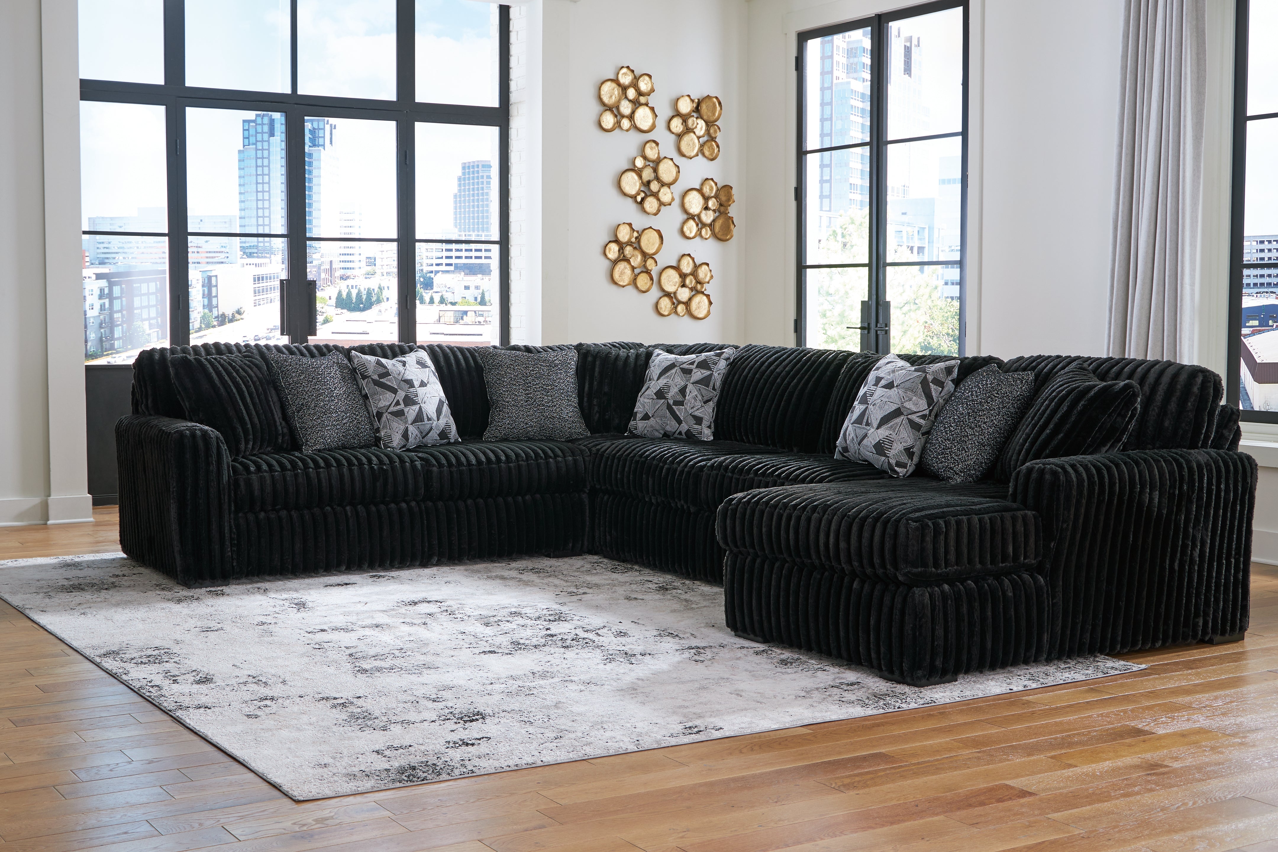 Tampa Furniture Outlet - Ashley Furniture - Midnight-Madness Sectional