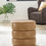 Tampa Furniture Outlet - Ashley Furniture - Ummi Living Room - Swivel Accent Ottoman / Caramel - A3000791