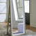 Tampa Furniture Outlet - Ashley Furniture - Evesen Mirror - Floor Standing Mirror/Storage - A8010380