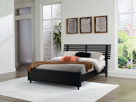 Tampa Furniture Outlet - Ashley Furniture - Danziar Bedroom - Queen Slat Panel Bed / Black - B1013B4