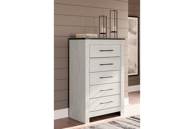 Schoenberg Chest - Tampa Furniture Outlet