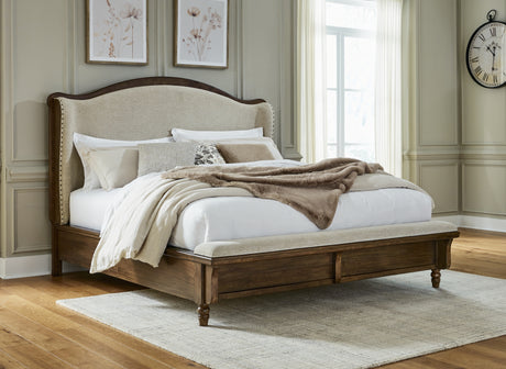 Tampa Furniture Outlet - Ashley Furniture - Sturlayne Bedroom - King Upholstered Panel Bed / Brown - B787B4