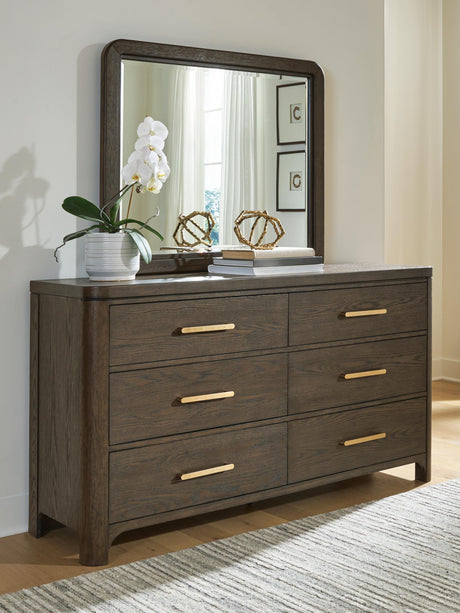 Tampa Furniture Outlet - Ashley Furniture - Radkin Bedroom - Dresser and Mirror / Burnished Brown - PCB843B1