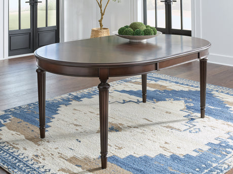 Tampa Furniture Outlet - Ashley Furniture - Lavinton Dining Room - Oval Dining Room EXT Table / Brown - D764-35