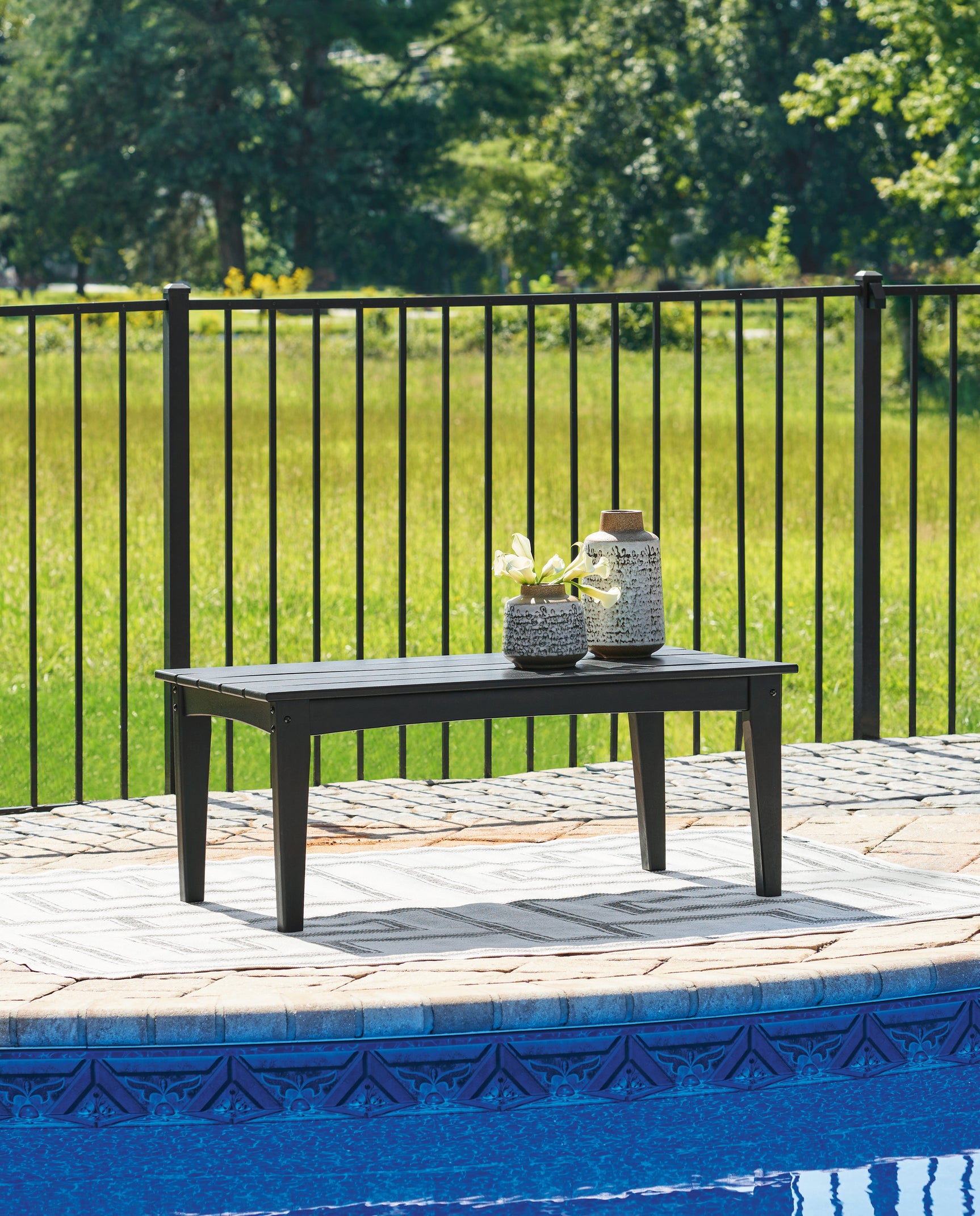 Tampa Furniture Outlet - Ashley Furniture - Hyland wave Outdoor - Rectangular Cocktail Table / Black - P108-701