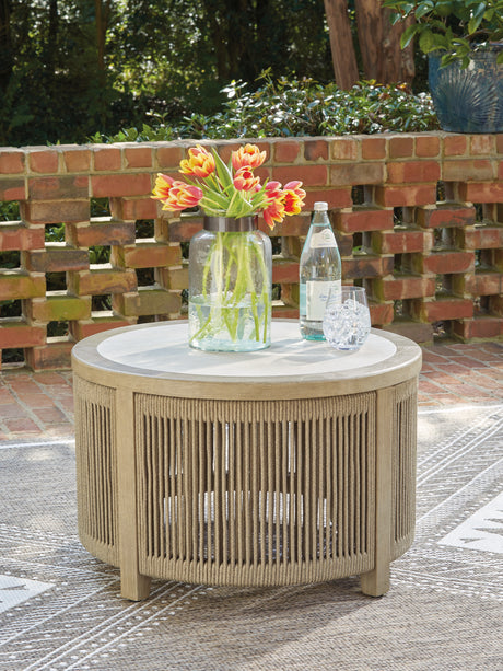 Tampa Furniture Outlet - Ashley Furniture - Spooners Cove Outdoor - Round Cocktail Table / Beige - PCP469-708