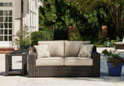 Tampa Furniture Outlet - Ashley Furniture - Coastline Bay Outdoor - Loveseat w/Cushion / Brown - P784-835