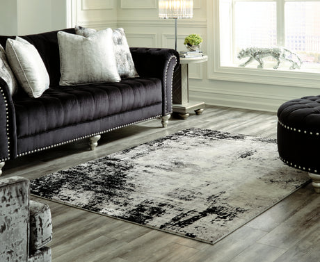 Tampa Furniture Outlet - Ashley Furniture - Zekeman Rug - 7'10" x 10' Rug / Black/Cream/Gray - R404921