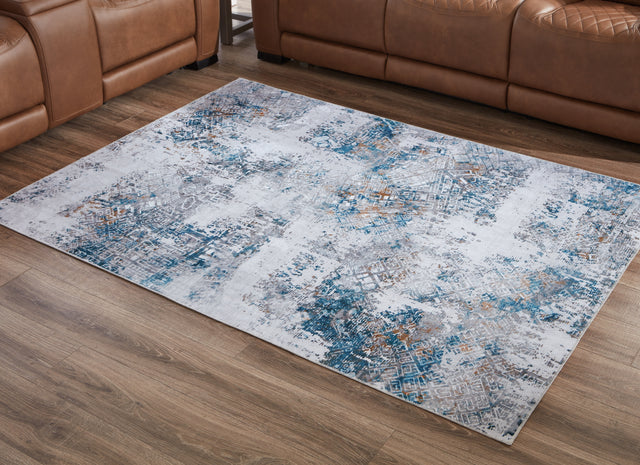 Tampa Furniture Outlet - Ashley Furniture - Garyard Rug - 5' x 7' Washable Rug / Multi - R405772