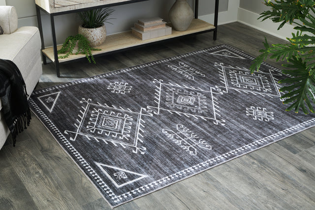 Tampa Furniture Outlet - Ashley Furniture - Arloman Rug - 5' x 7' Washable Rug / Black/Cream/Gray - R405932