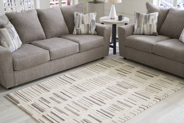 Tampa Furniture Outlet - Ashley Furniture - Leesdale Rug - 8' x 10' Rug / Ivory/Brown/Black - R406421