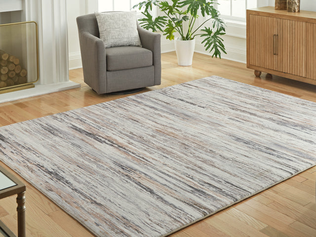 Tampa Furniture Outlet - Ashley Furniture - Nace Rug - 5' x 7' Area Rug / Gray/Brown/White - R407472