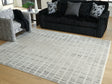 Tampa Furniture Outlet - Ashley Furniture - Turinwith Rug - 5'3" x 7' Area Rug / Ivory/Black - R407552