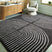 Tampa Furniture Outlet - Ashley Furniture - Eldonmore Rug - 5' x 7' Area Rug / Black/Ivory - R407572