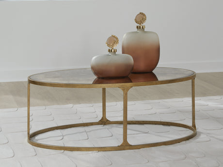Tampa Furniture Outlet - Ashley Furniture - Korajane Coffee Table - Oval Cocktail Table / Antique Gold - T399-0